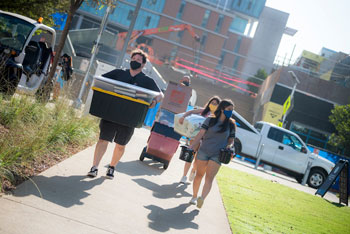 students with boxes