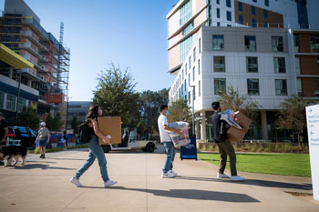 students with boxes