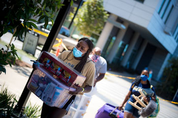 students with boxes